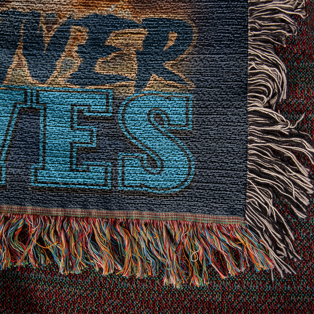 Wrap Yourself in Pride with the Eagle River Wolves Woven Blanket!